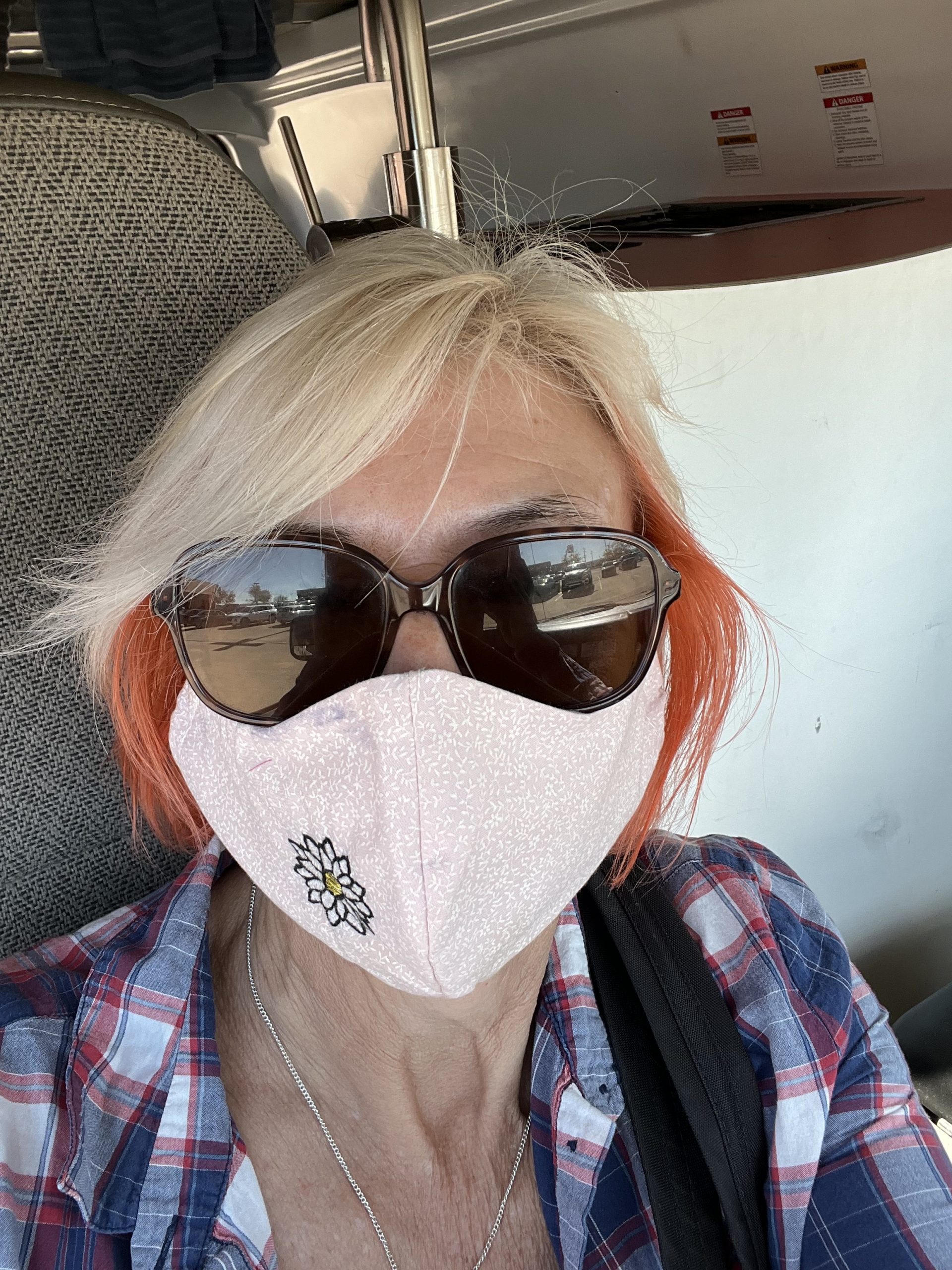 alt="me with a face mask on"