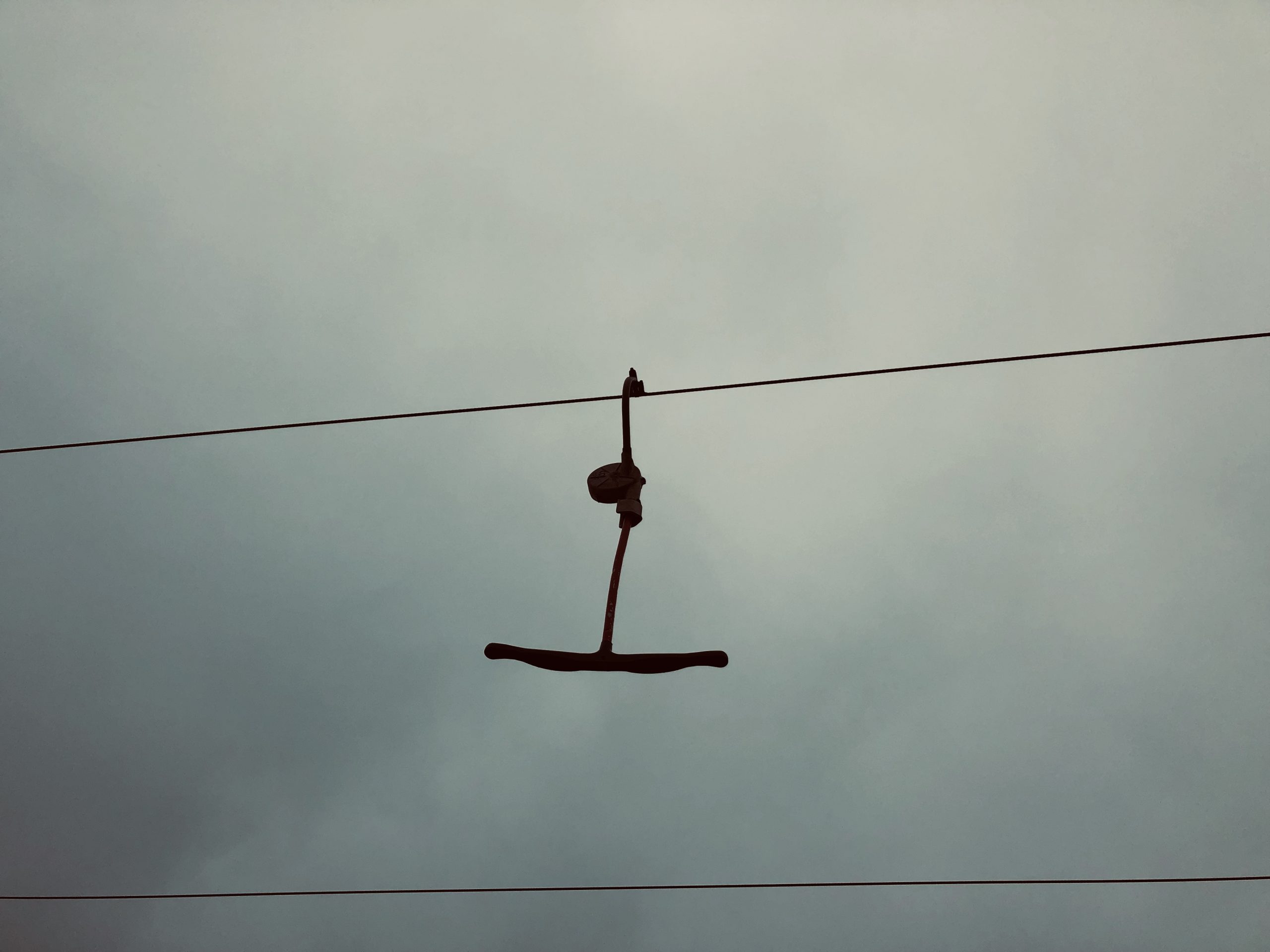 alt="arial cable of ski lift"