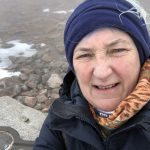 alt="me in cold weather hat & coat"