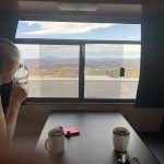 alt="table inside van with cups of tea"