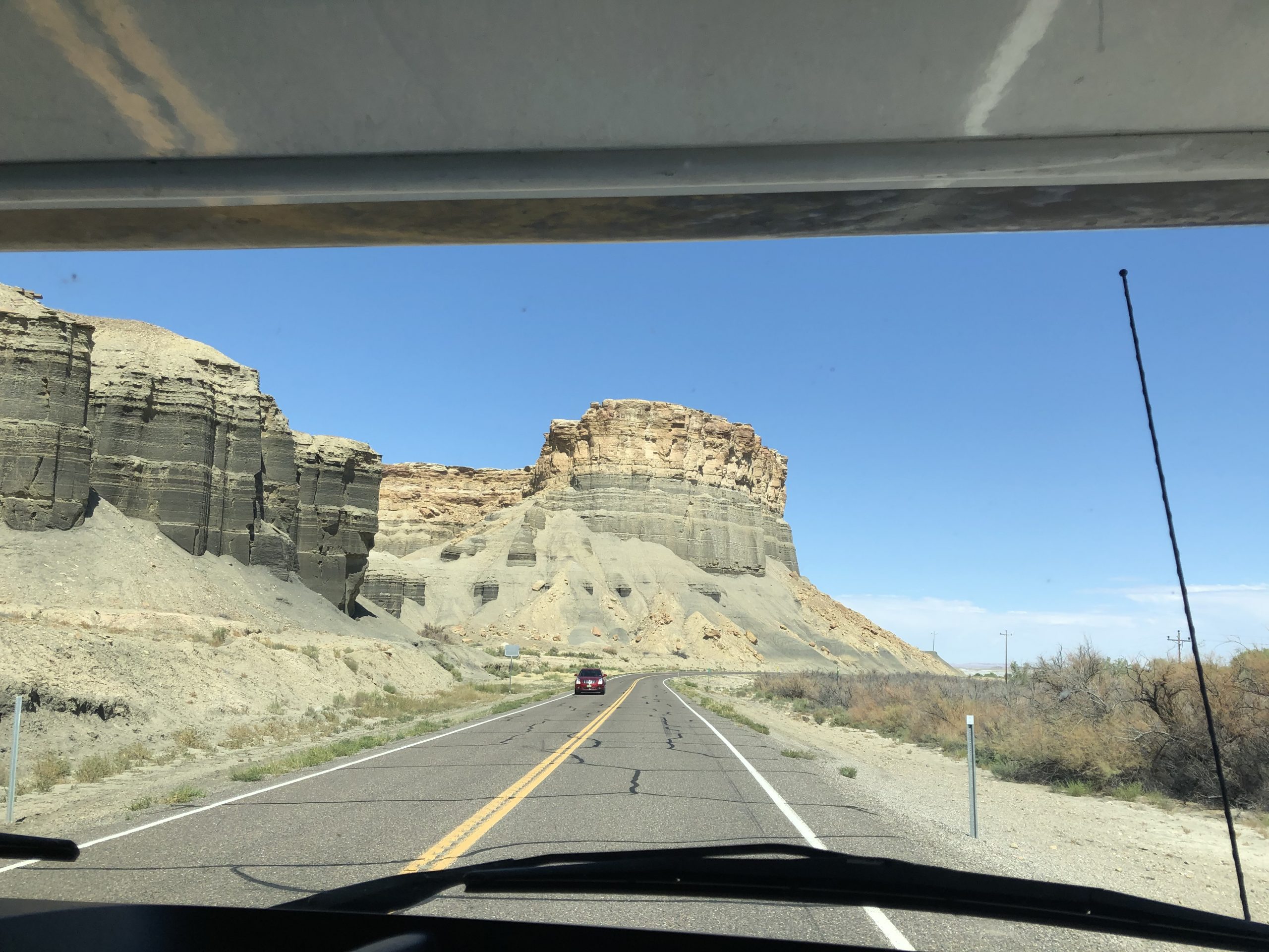 alt="rock formations alongside the road"