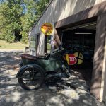 alt="private garage with old motorbikes"