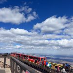 alt="train station at mountain top"