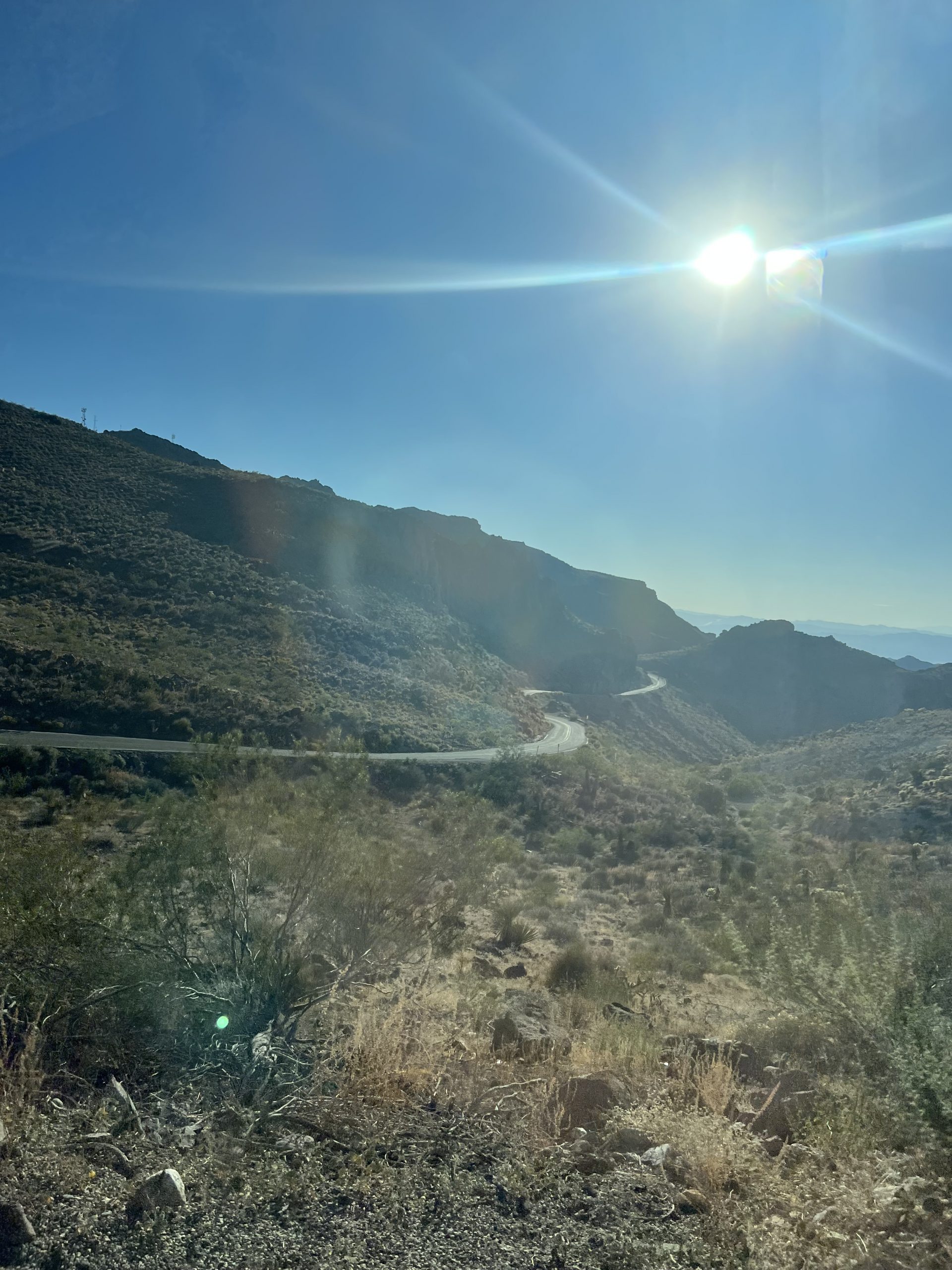 alt="looking across a valley at the way the old route 66 snakes through the side of the hill"