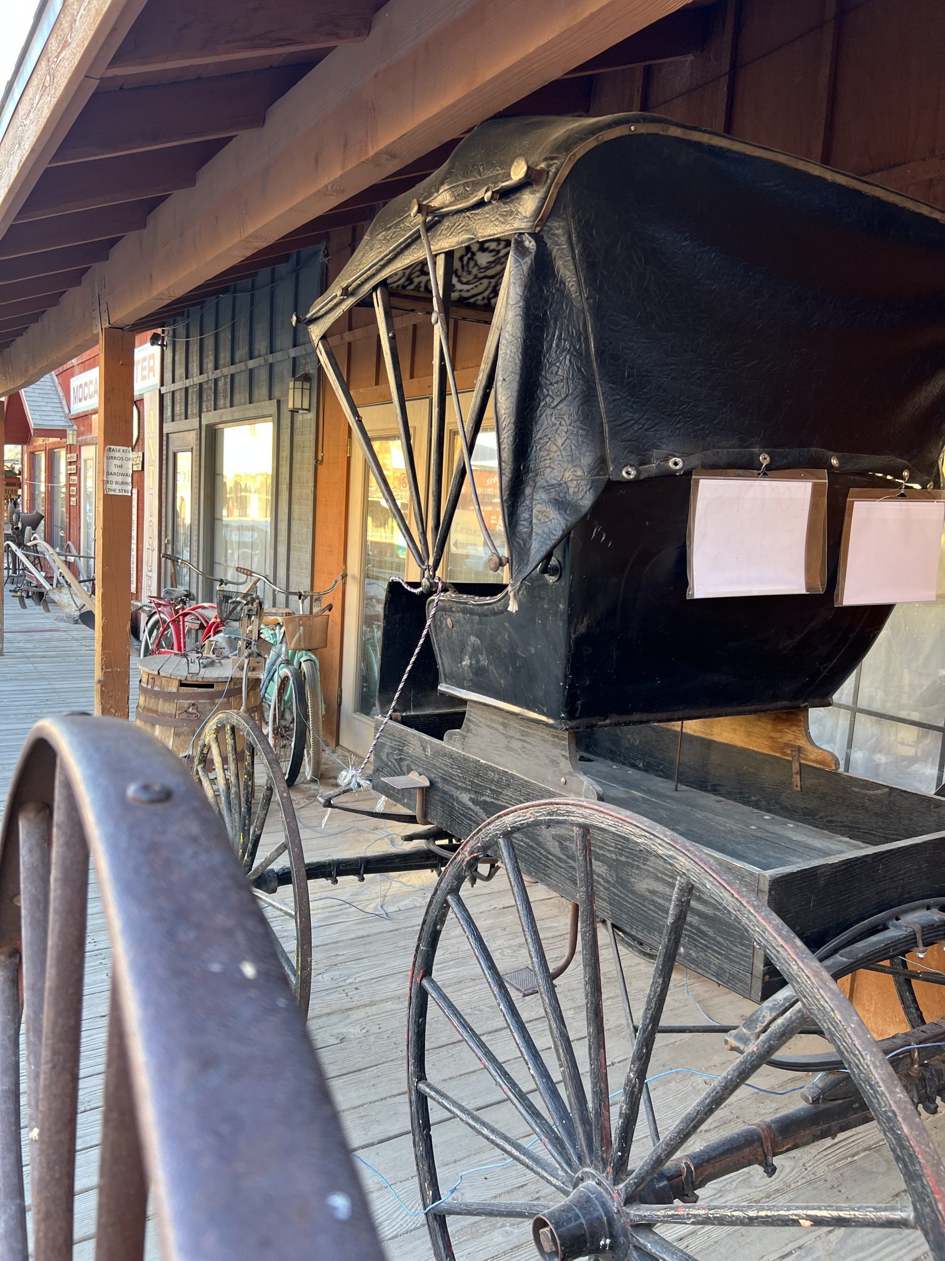 alt="old style buggy normally pulled by a horse"