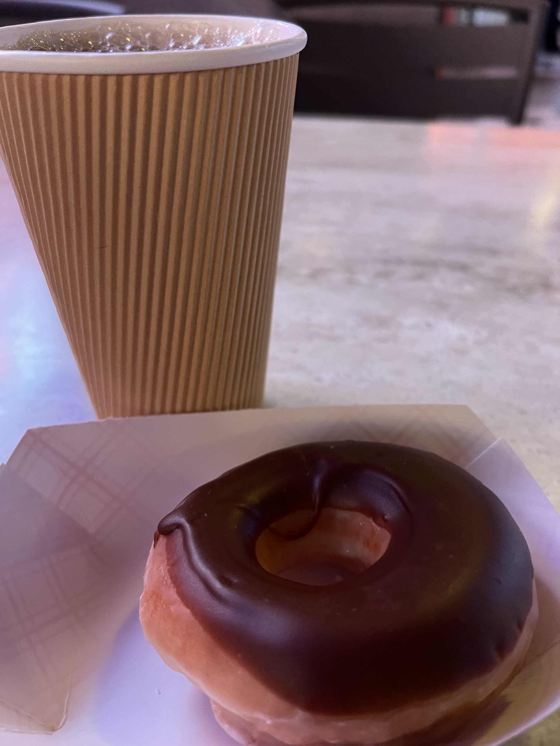 alt="a cup of coffee & doughnut in Las vegas"
