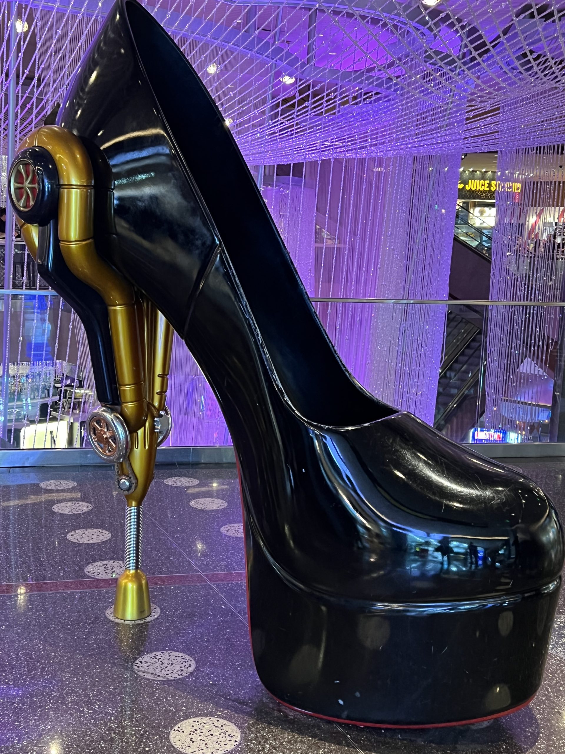 alt="a giant model of a high heeled shoe in a Las Vegas Mall"