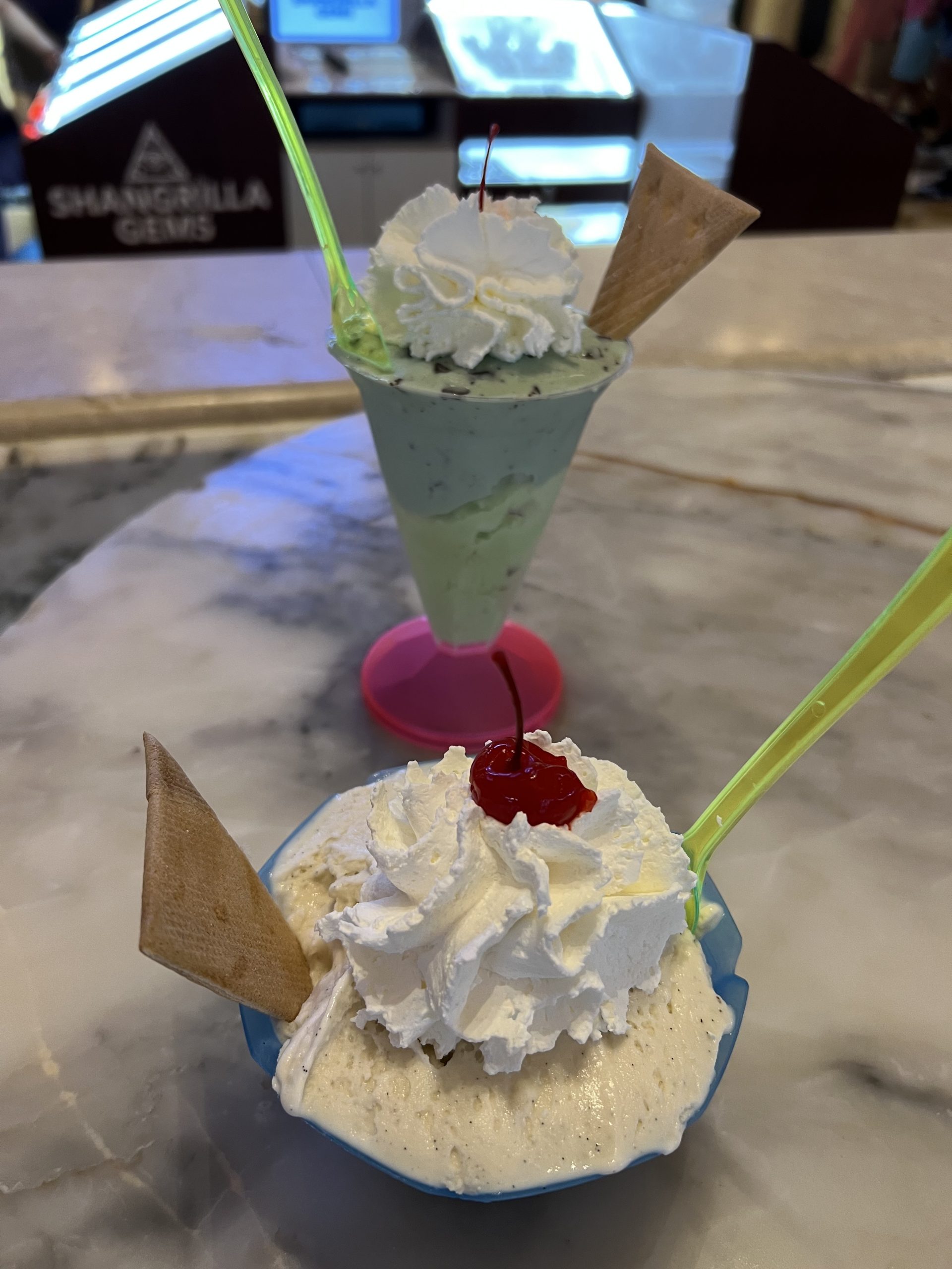 alt="two cream based desserts in unusual shaped dishes"