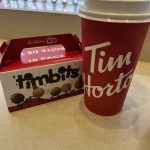 alt="box of doughnut holes & coffee"