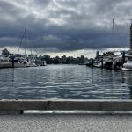 alt="stretch of water with boats"