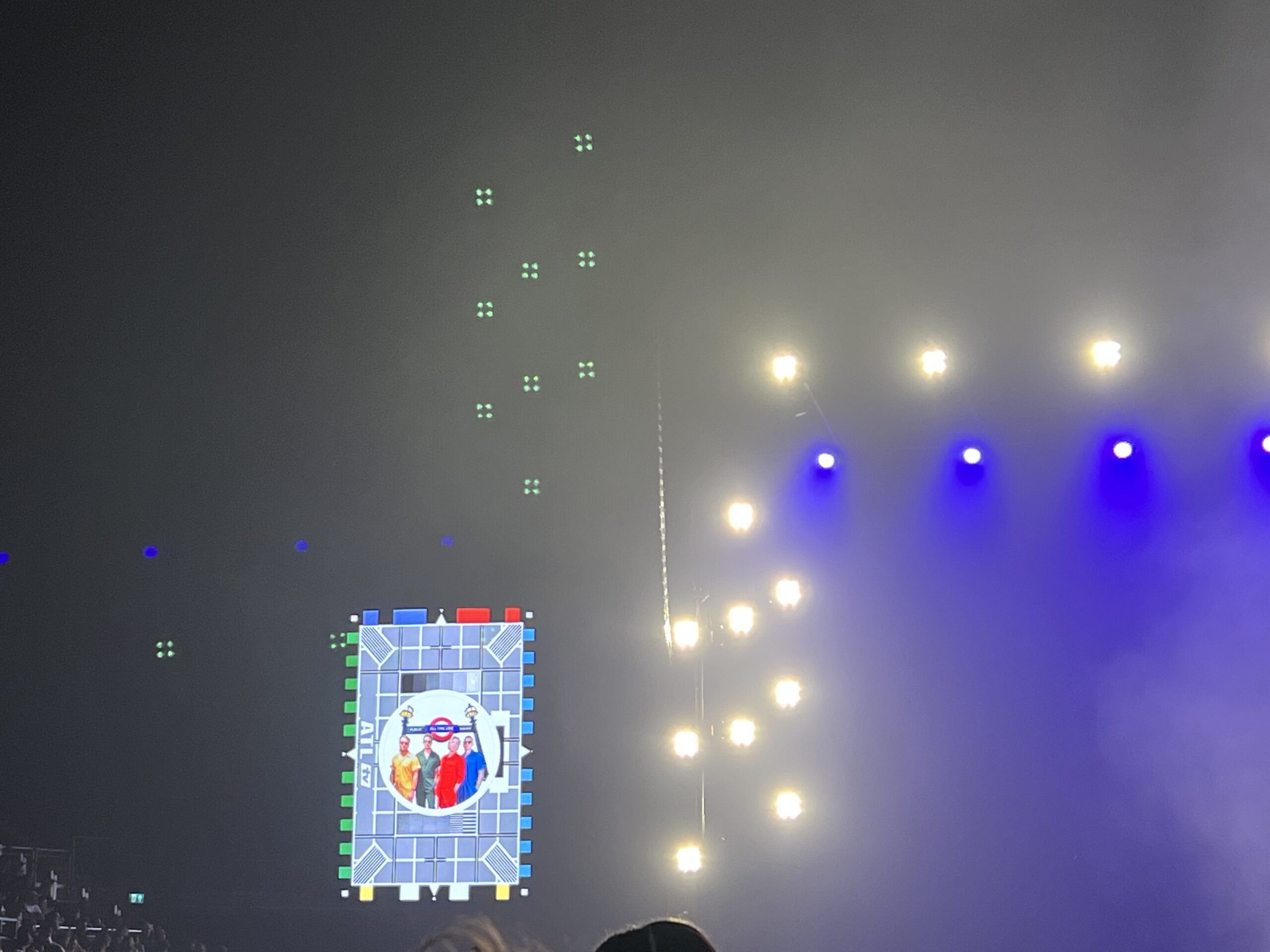 alt="test card image featuring the members of All Time Low band"