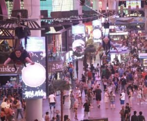 alt="me on a zippier over the shoppers in Downtown Las Vegas