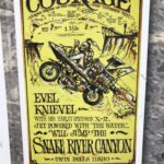 alt'"old advertising poster with even kinievel information"