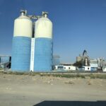 alt="two cement silos"