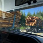 alt="passing huge logging lorry"