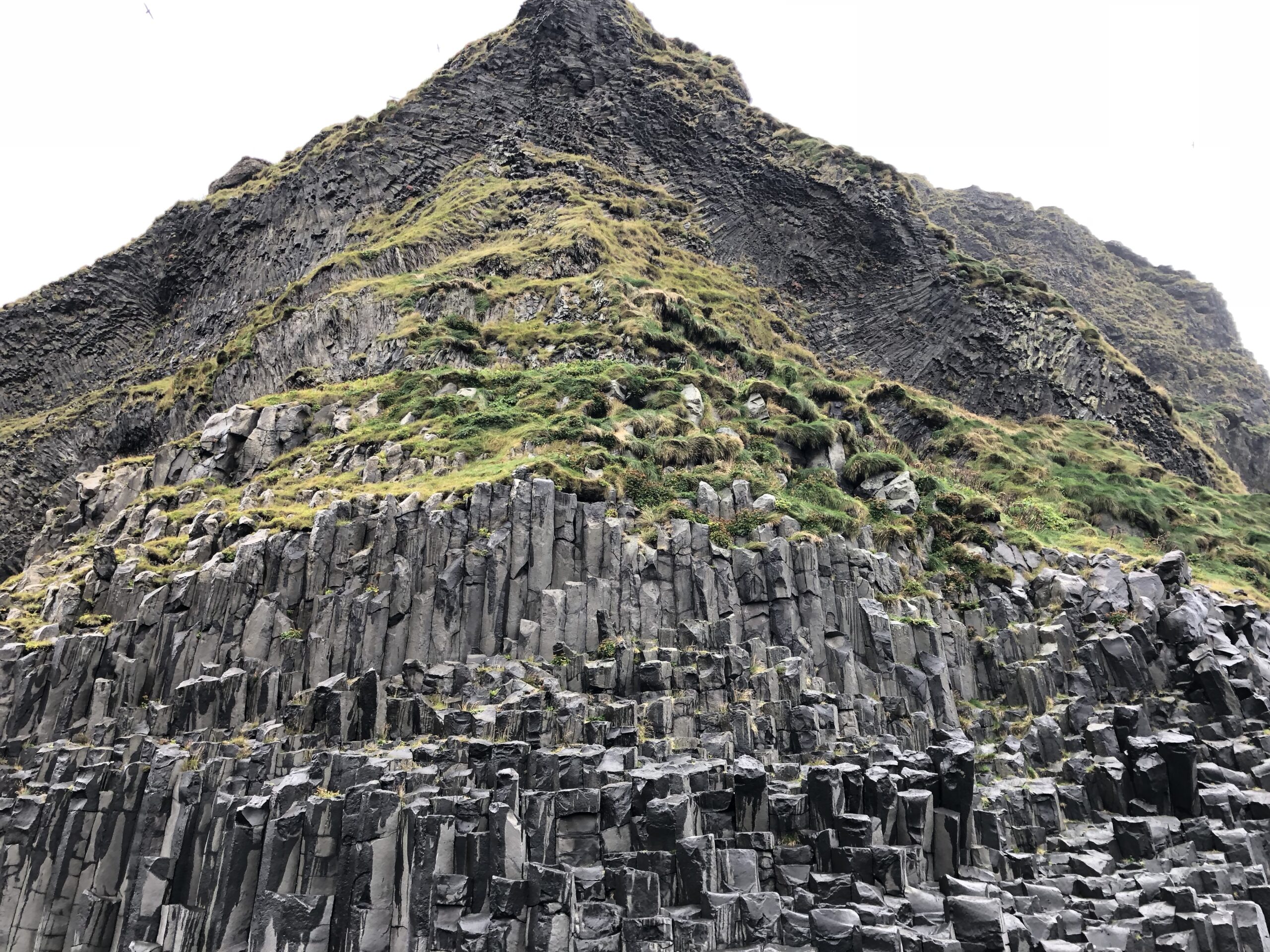 alt="strange cliff made of unusual rock formation"