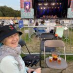 alt="me sat in a 'pen' socially distanced area"