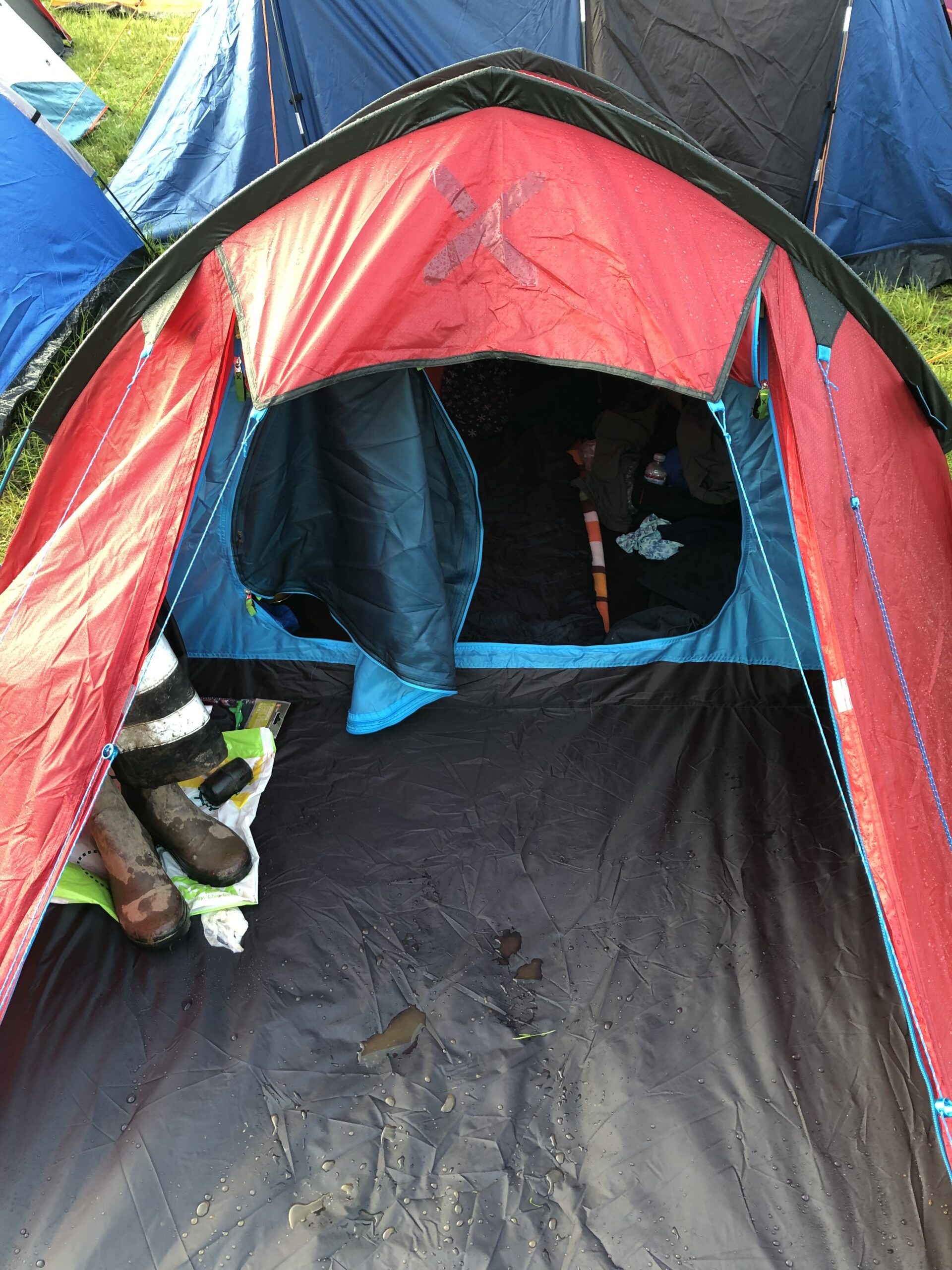 alt="doorway to small festival tent"