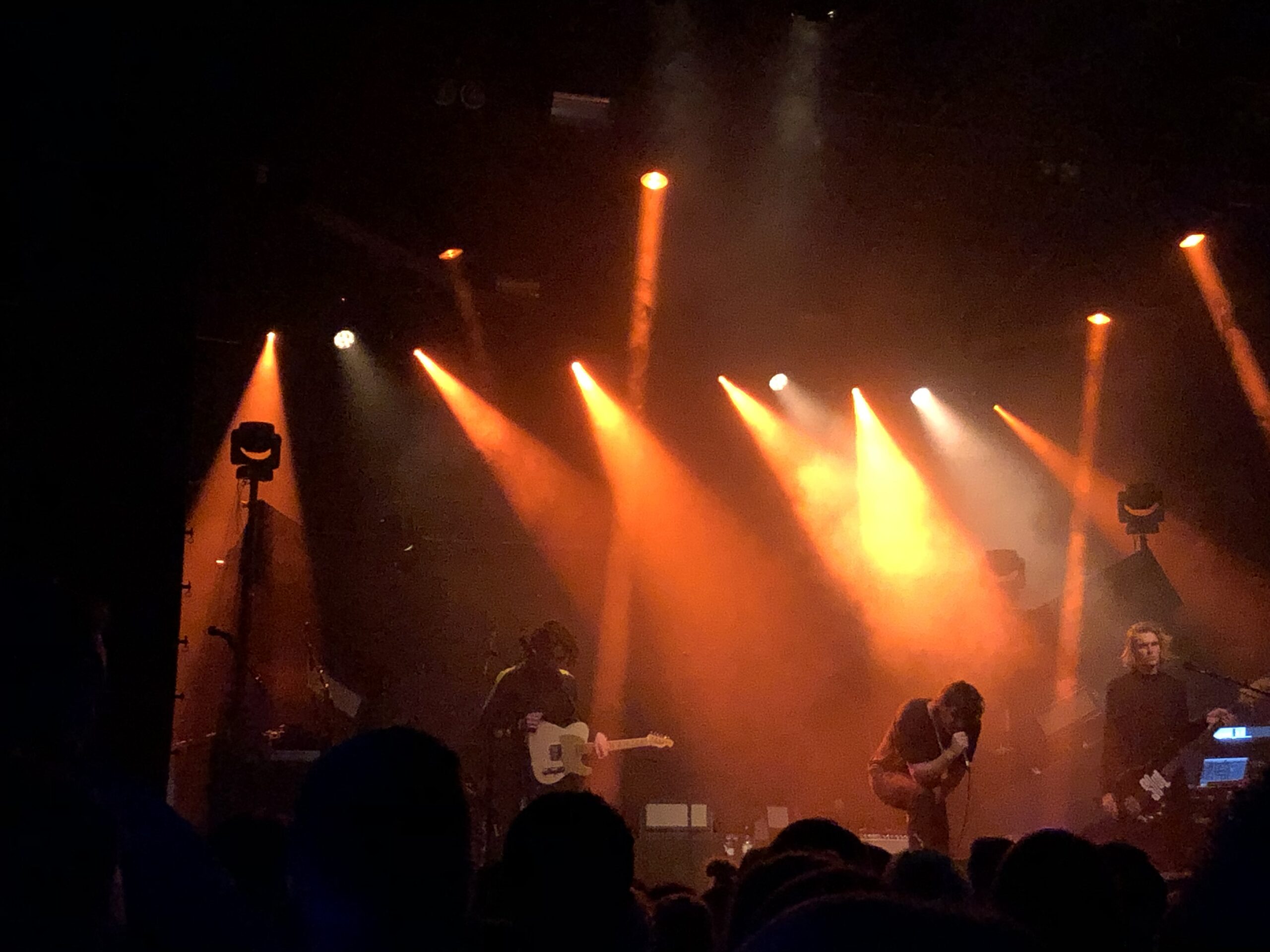 alt="band on stage"
