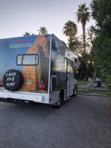 alt="van parked in campsite slot"