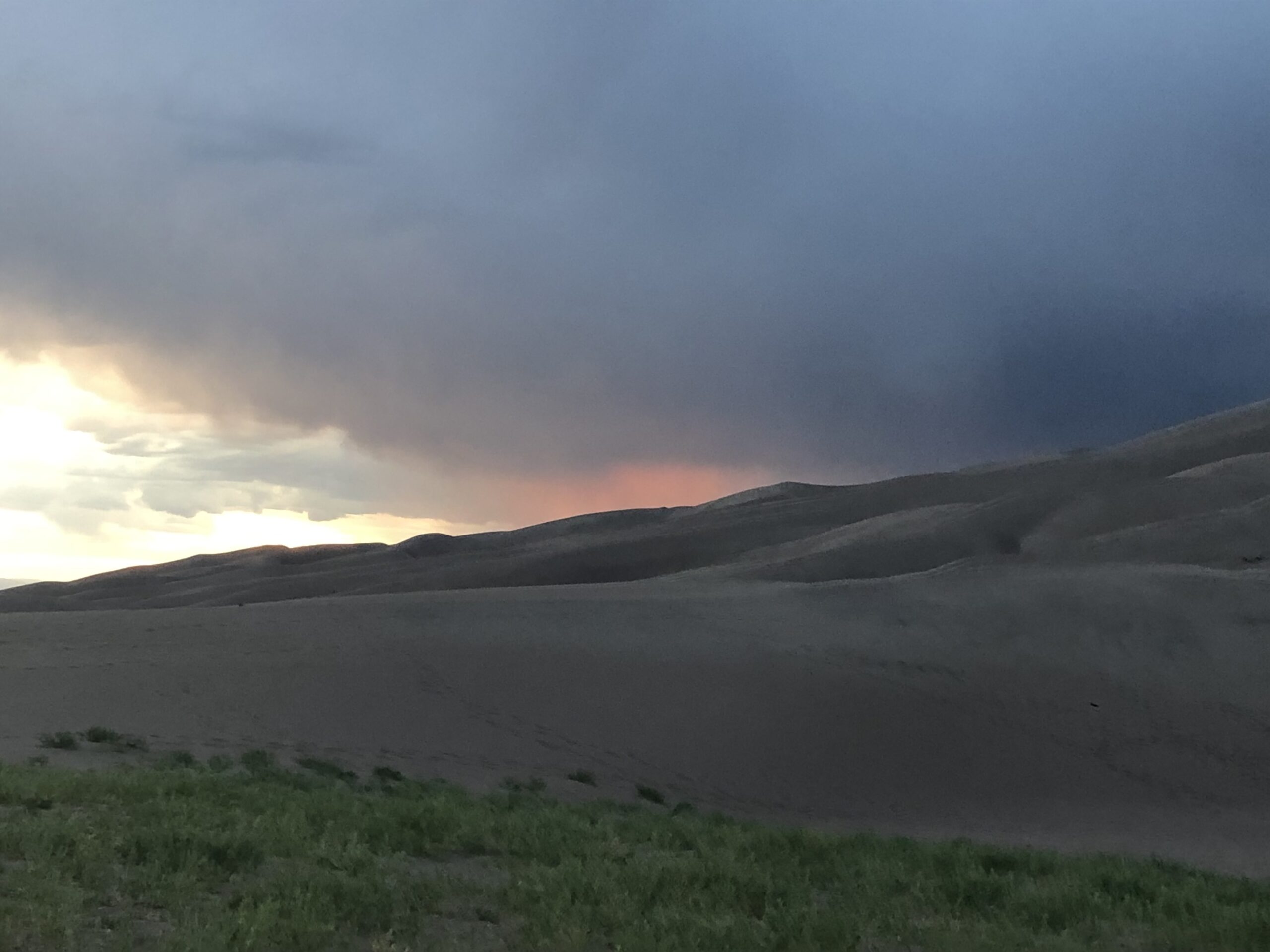 alt="sand dunes with sky & clouds"