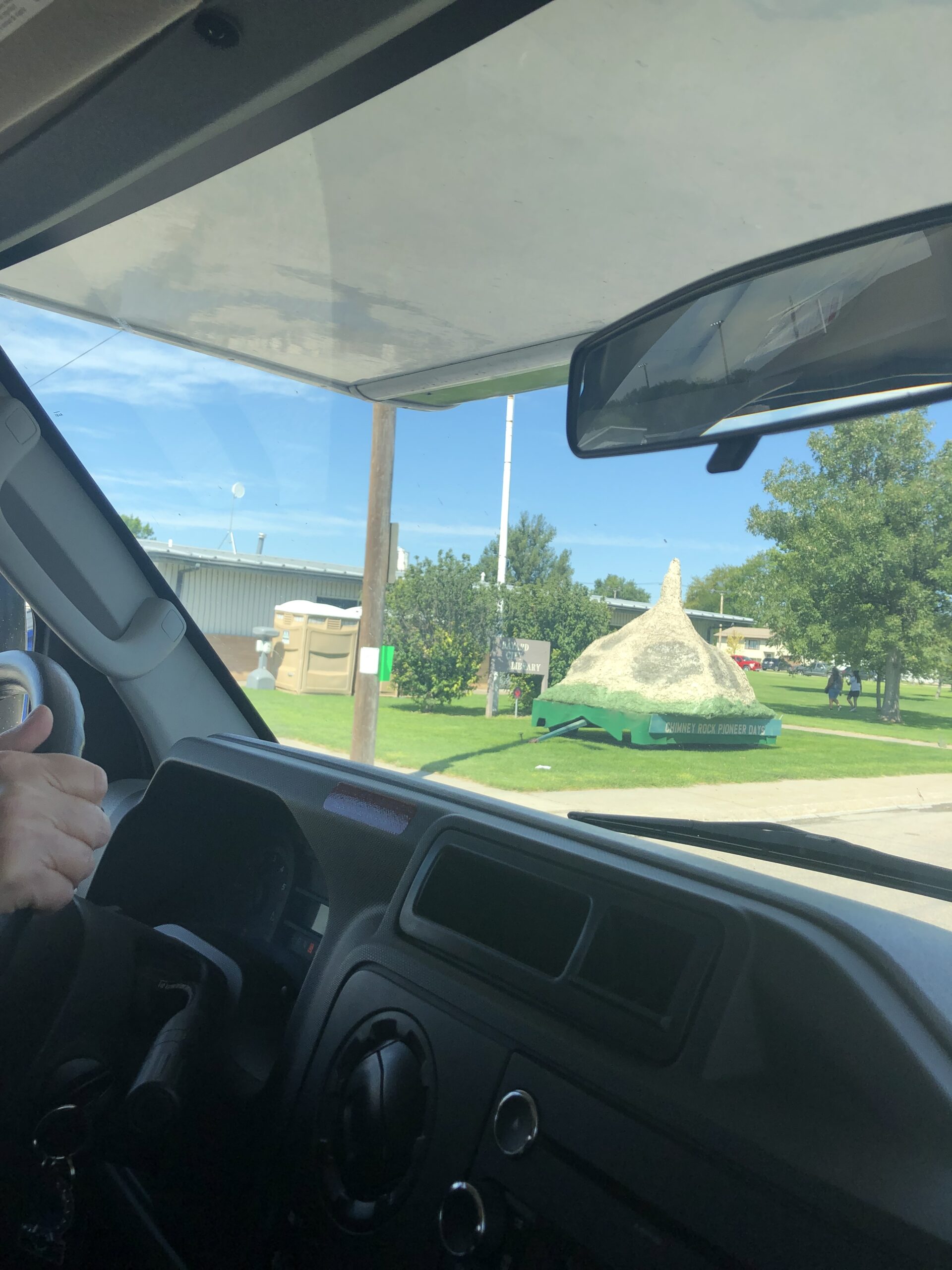 alt="carnival float on side of the road"
