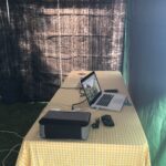 alt="table with computer on"