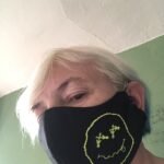 alt="person with mask on"