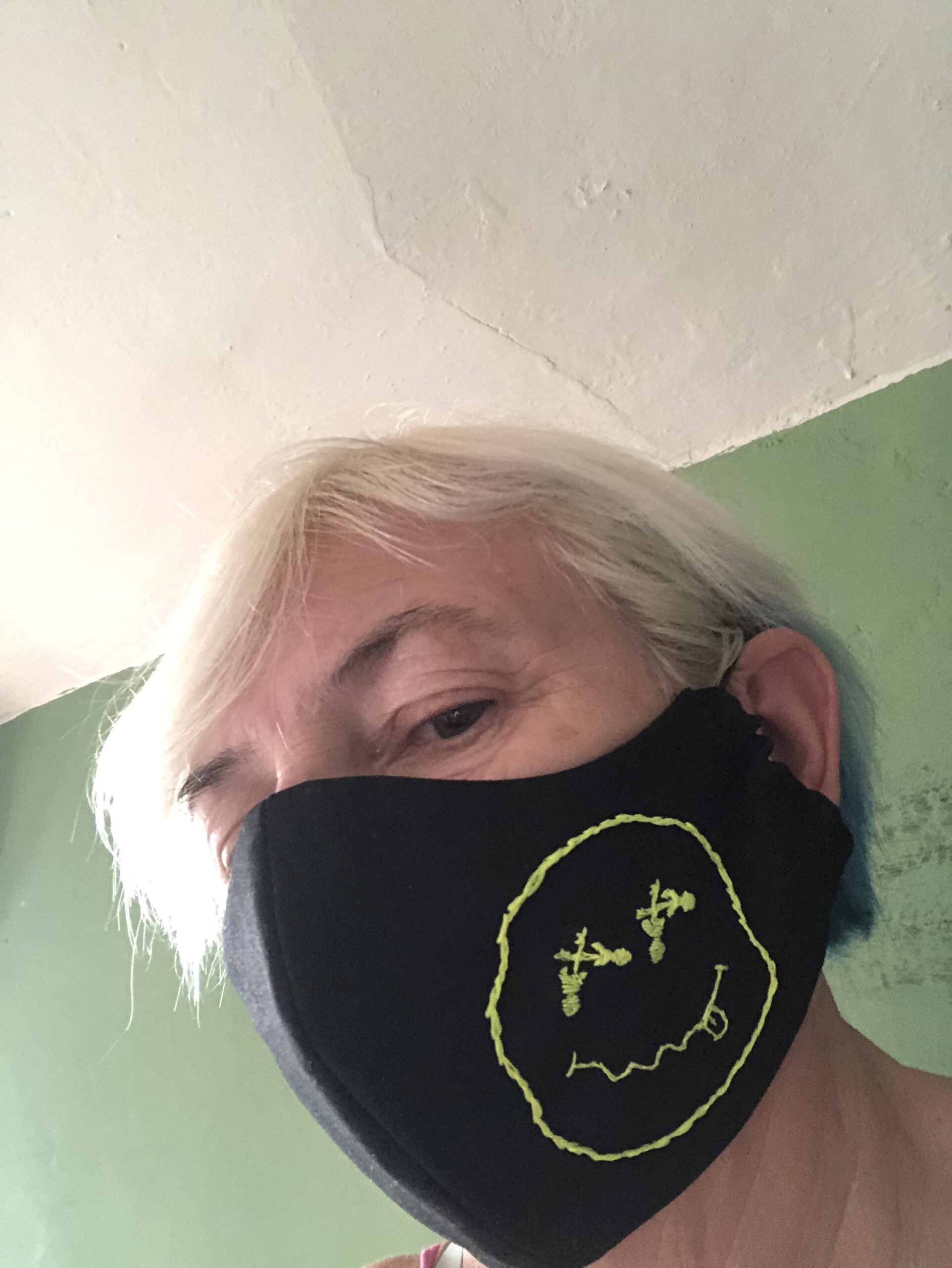 alt="person with mask on"