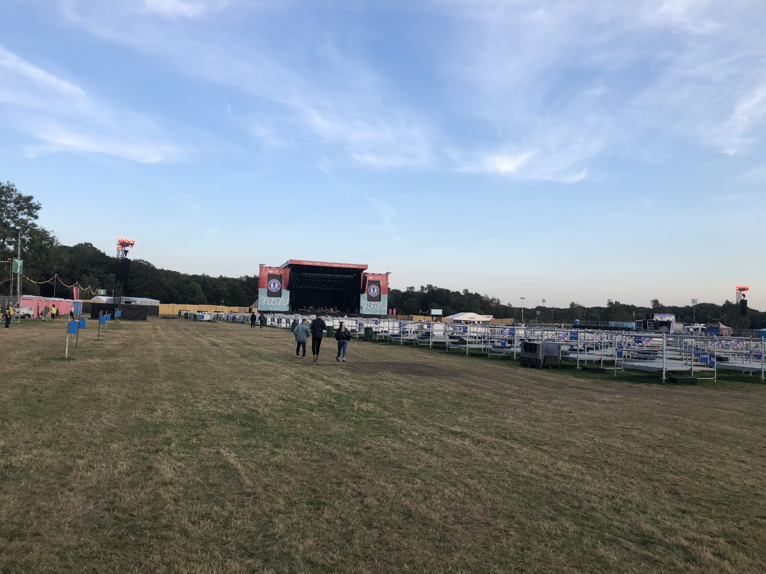 alt="filed with stage in background"