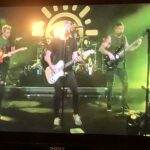 alt="the band All Time Low playing"