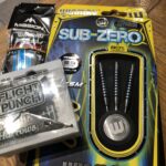 alt="sets of darts in packets"