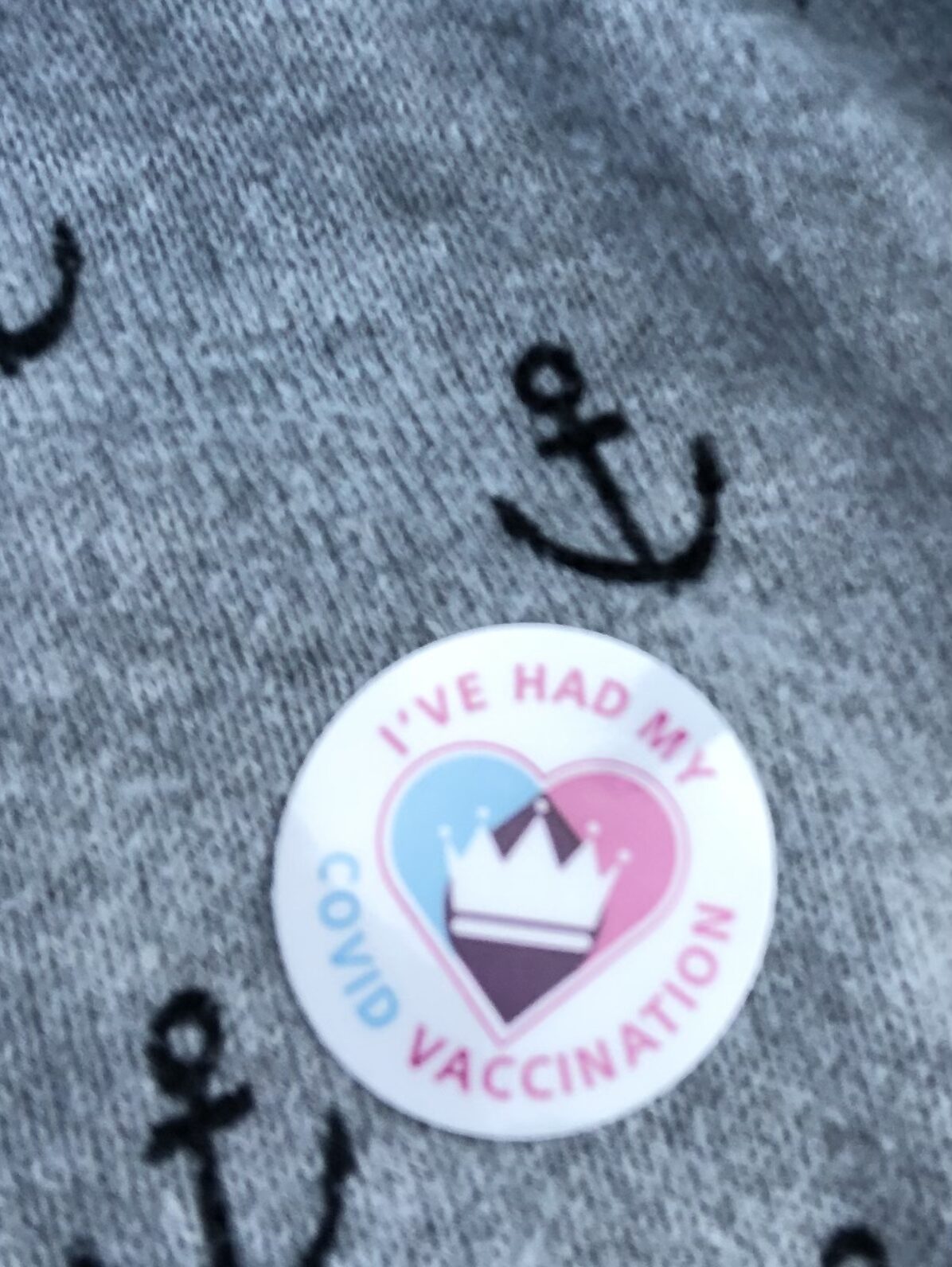 alt="different covid sticker"