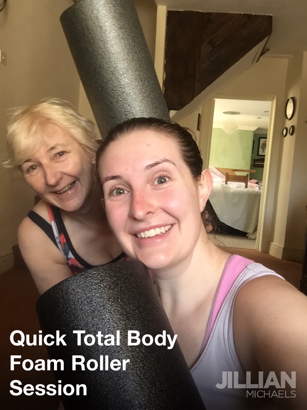 alt="two people with foam rollers"