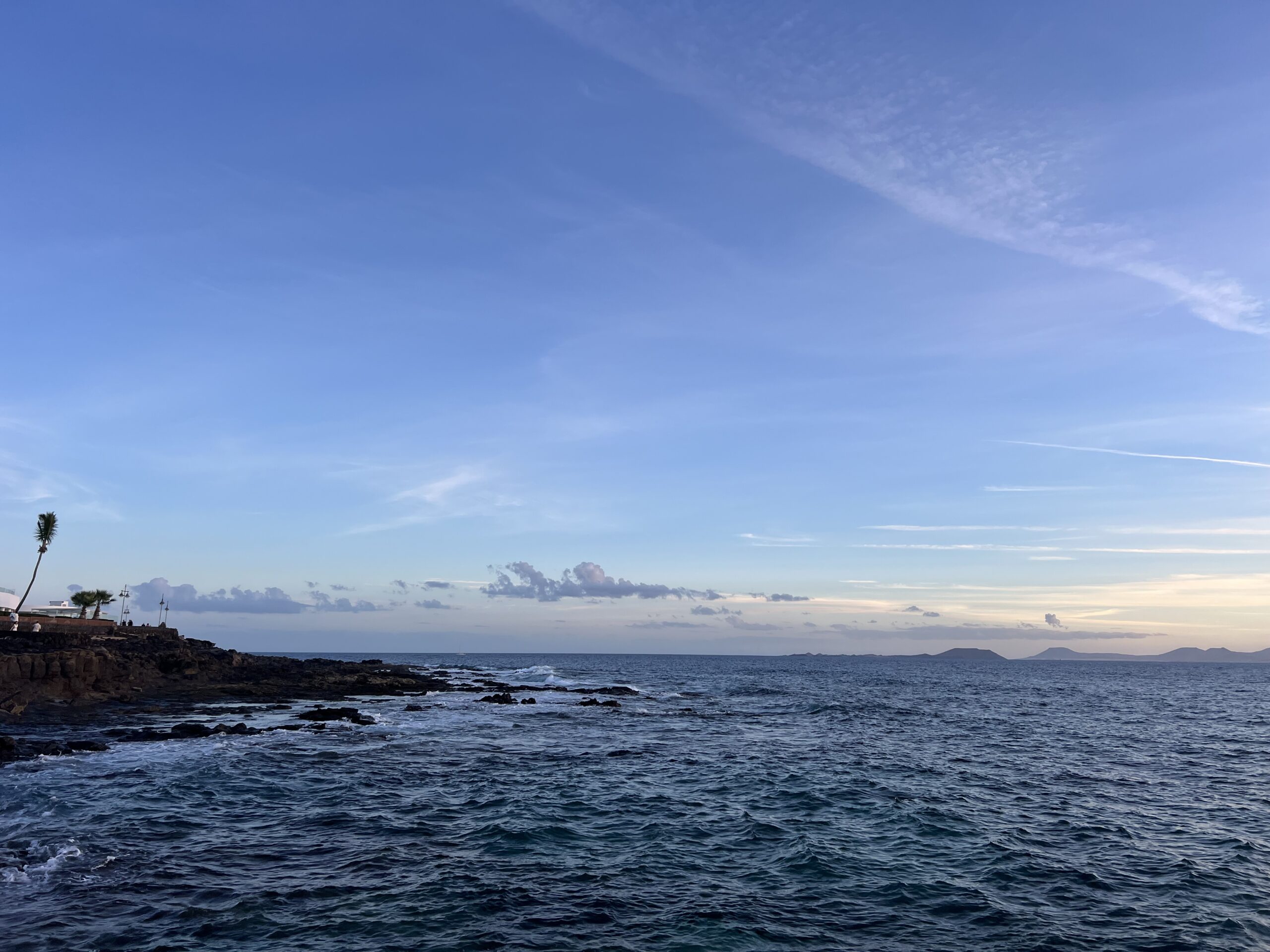alt="shore line with waves"