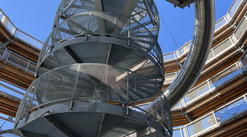 alt="spiral sthaicase made of metal & wood"